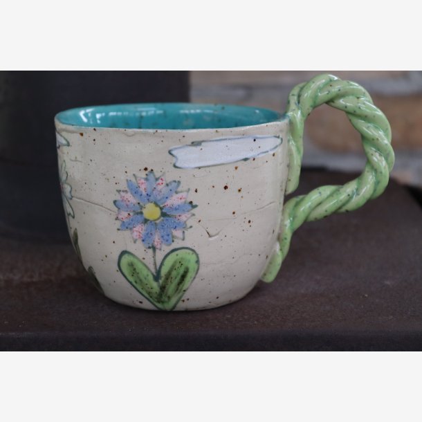 Krus med blomster